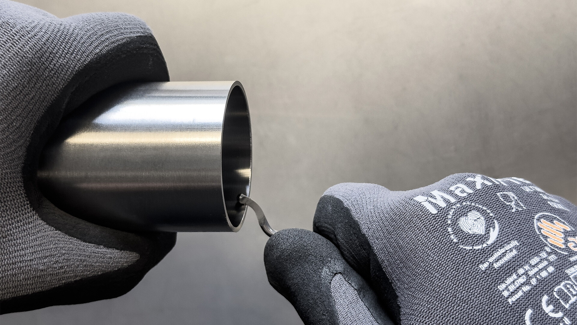 Removal of burrs and irregularities from tube ends